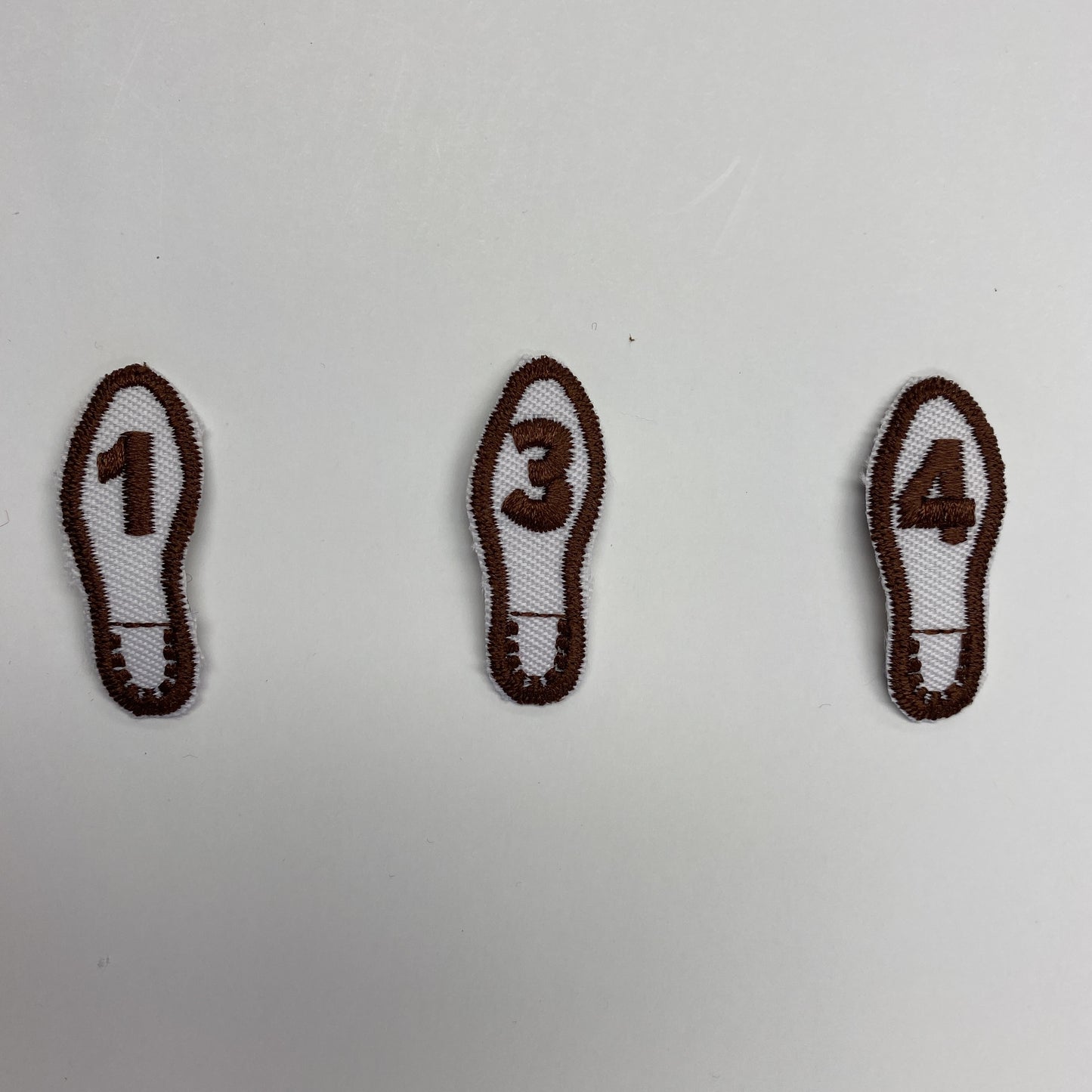 Emblem Foot Print